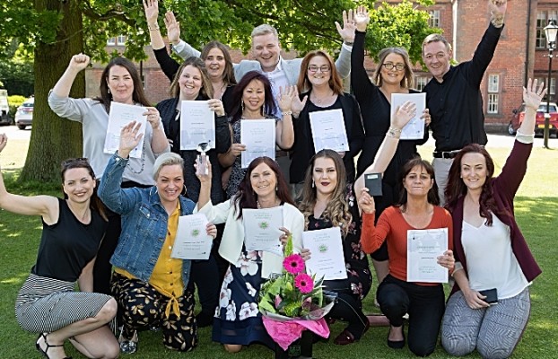 Belong Crewe team celebrate receiving diplomas (1)