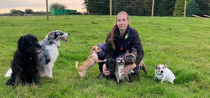 Emma Caskie with HoundClub Pet Services dogs