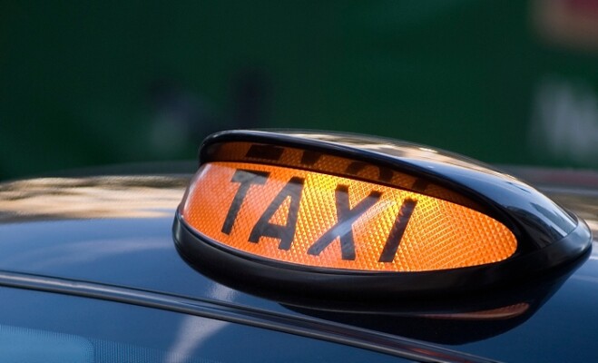 Lighted taxi sign on a Black London cab