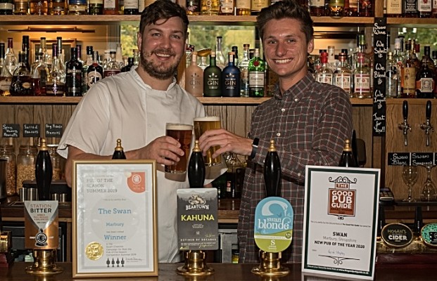 The Swan celebrates- chef Matt Marren and landlord Tom Morgan-Wynne raise a glass to the Good Pub Guide and Camra awards.