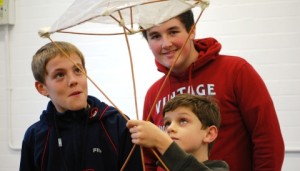 Eric Green and Tom Williams make a lantern with Jack Humphreys