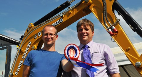 Adam Withnell and mark Towers with Caterpillar digger at Cheshire Show