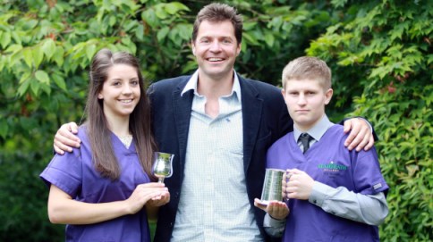 an man Top veterinary care assistants Fiona Moss and Liam Grocott with Steve leonard