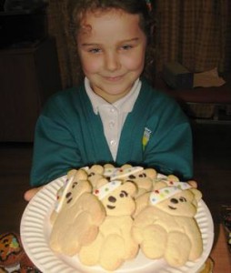 Wyche pupil with Children in Need gingerbread