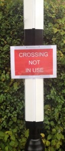 crossing not in use sign