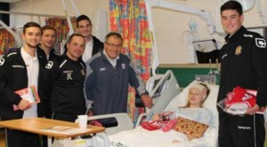 Dario Gradi and Crewe Alex stars visit Leighton Hospital children