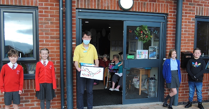 Pupils from Highfields and Acton delivering cards to Barony Lodge (1)