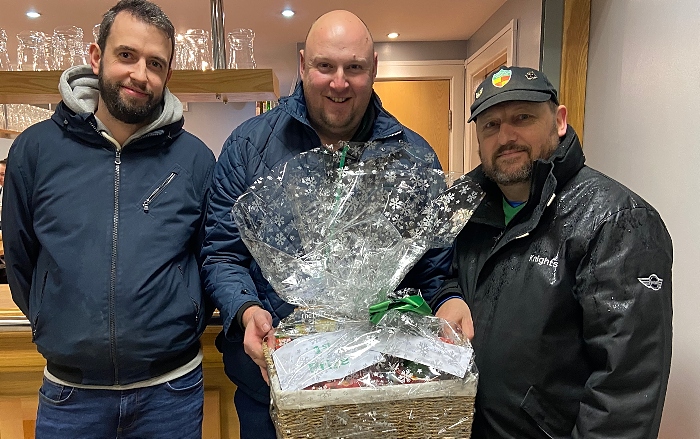 l-r NTISA members Andy Jones and Ian Garnett present the first prize hamper to David Vickers (1)