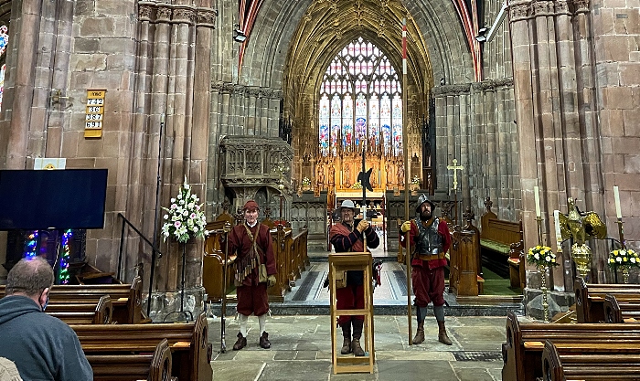 Alex Thompson (centre) of The Sealed Knot gives a talk inside St Marys Nantwich relating to the English Civil War alongside a Musketeer and a Pikeman (1)
