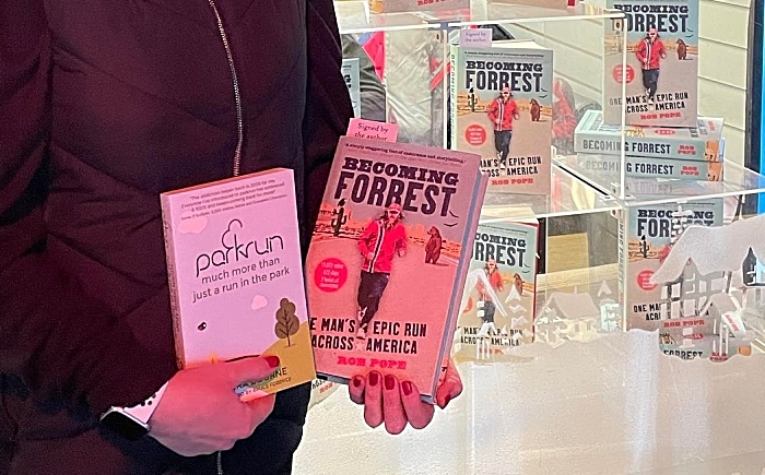 Nantwich Bookshop staff member Kathryn Rush with the Becoming Forrest Gump book and window display (1)