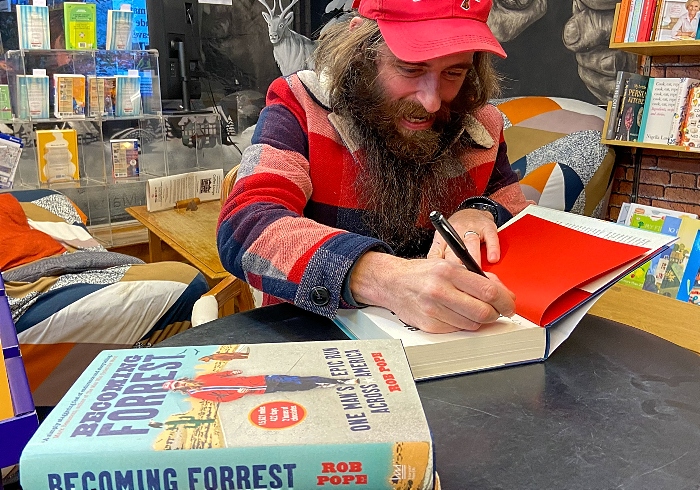 Rob Pope signs a copy of his book ‘Becoming Forrest’ (1)