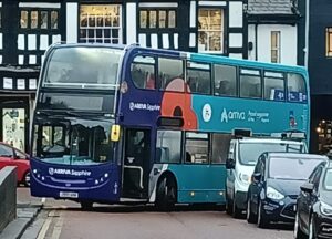 Bus stuck in Nantwich town centre by van on yellow lines