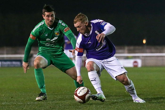 First-half - Matt Bell puts pressure on Grantham captain Elliot Durell (1)