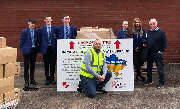Local schoolchildren from Sir Thomas Moore High School brought donations and volunteered