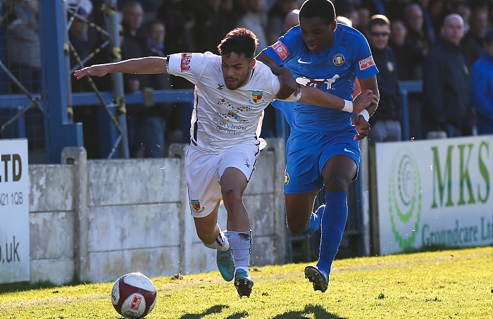 Second-half - Akiel Raffie fights for the ball (1)