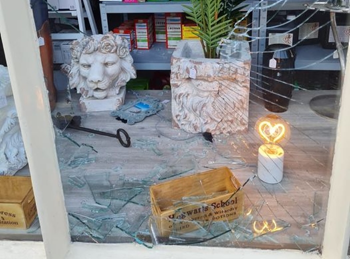 shop window smashed pillory street