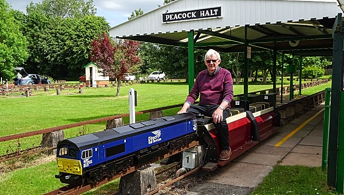 A volunteer sets up a battery electric train for the train rides event (1)