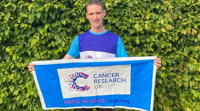 Paul Dean with Cancer Research UK logo (1)