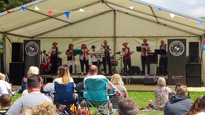 South Cheshire 'George Formby' Ukulele Society perform on stage (1)
