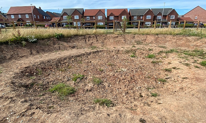 Dried up pond at Malbank Waters housing development (1)