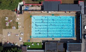 People cooling off in Nantwich outdoor pool