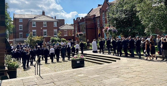 Pallbearers carry the coffin of Jordan Gatley (right) towards the guard of honour (left) in front of St Marys Nantwich (1)