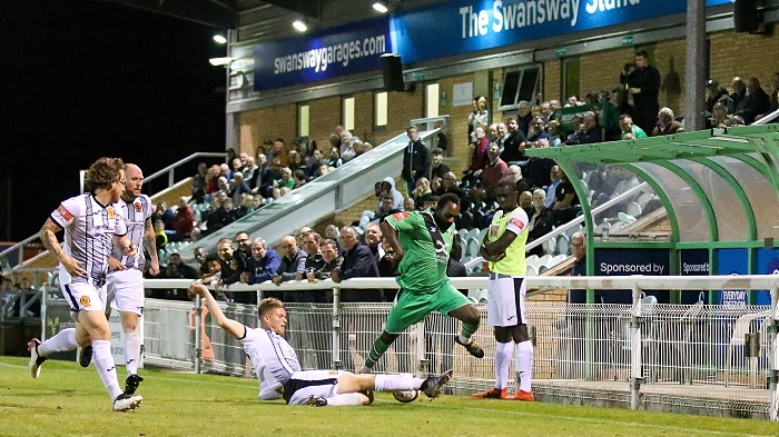 Second-half - Joe Mwasile is tackled in front of the Swansway Stand (1)