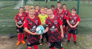 Nantwich football team net key support from Crewe Alex sponsors