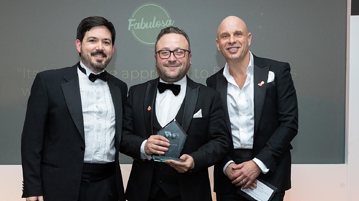 Adam Burnett, Group Marketing Director at Fabulosa (pictured centre), Collecting the Disruptor of the Year Award on Behalf of Fabulosa (1)