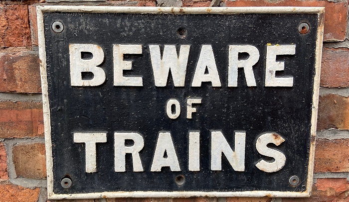 Beware of Trains sign - railway