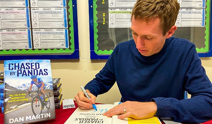 autobiography of cycling ace - Dan Martin signs his book Chased By Pandas (1) (1)