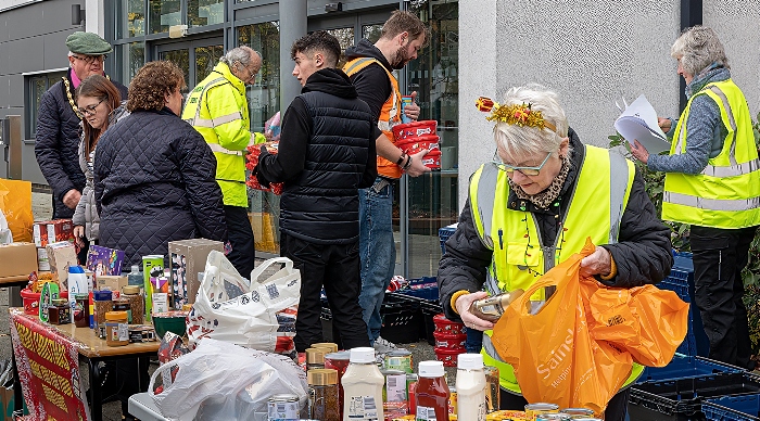 Volunteers busy sorting donations (1)