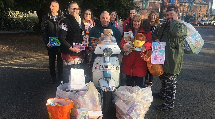 Aynsley Wilson (seated) and Keith Williams collect toys from Wellbeing Team 1 (1)