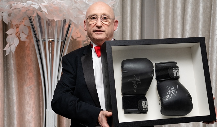 Ken Lawton and his boxing gloves donated to the fundraising auction - safety campaign