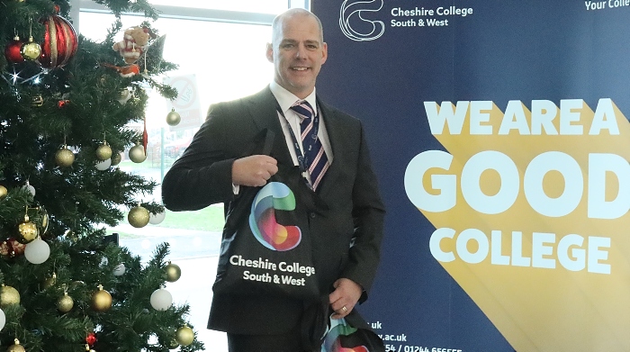 Mark Parsons with college hampers