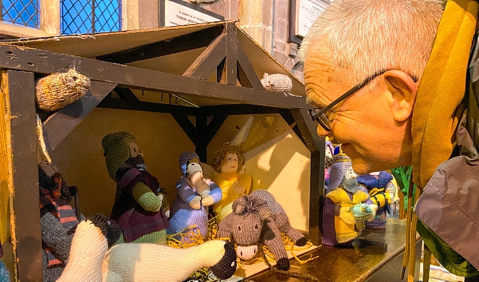 Visitor Mark Ray views a nativity scene (1)