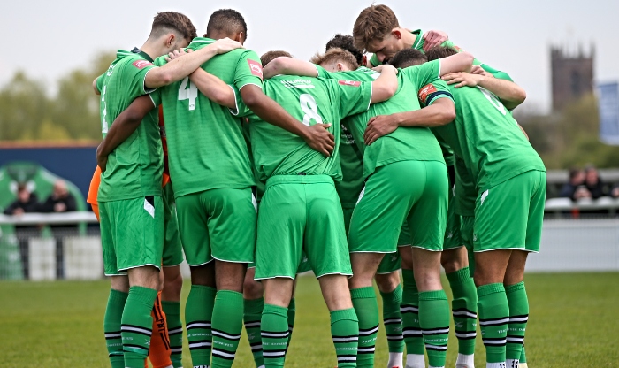 relegated - Dabbers players pre-match huddle (1)
