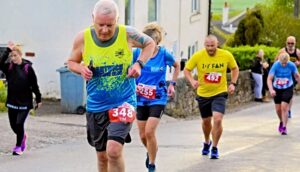 Nantwich runners take Mow Cop Killer Mile in their stride