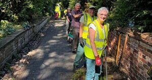 Volunteers pile in to clean up historic green lane in Nantwich