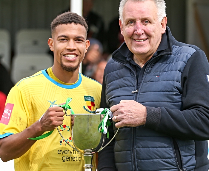 Full-time - Nantwich Town Football Club Chairman Jon Gold (right) presents the Eddie Morris Memorial Trophy to Dabbers captain Troy Bourne (1)