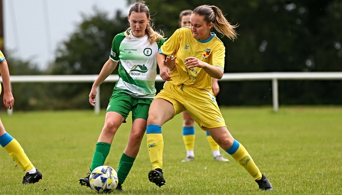 Nantwich Town Ladies FC (yellow kit) fight for the ball (1)