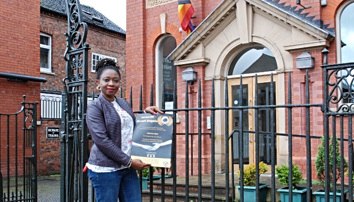 Amaka Lawton with Street Angels poster