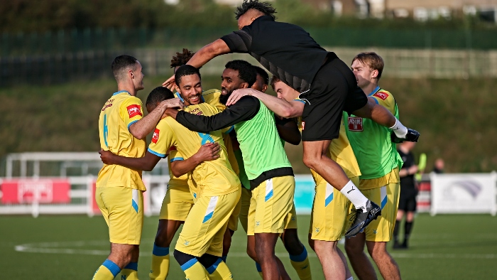 FA Trophy - Ahmed Ali celebrates scoring the winning penalty with teammates (1)