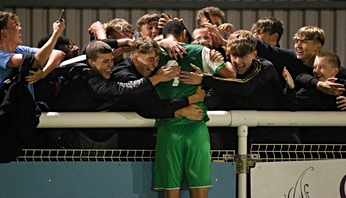 Full-time v Runcorn Linnets - Nantwich Refrigeration Services Man of the Match Byron Harrison celebrates with fans at full-time (1)