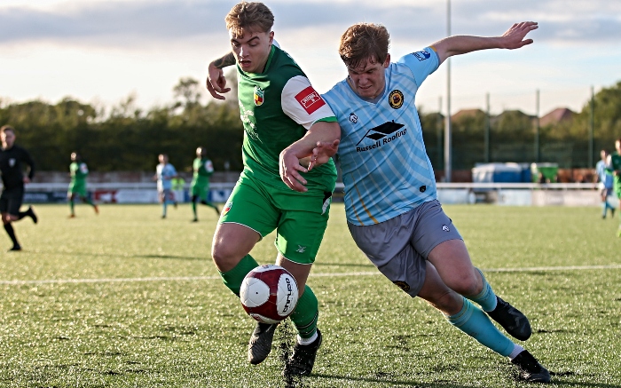 Second-half - Connor Heath is strongly challenged to the ball by Prescot Cables (1)