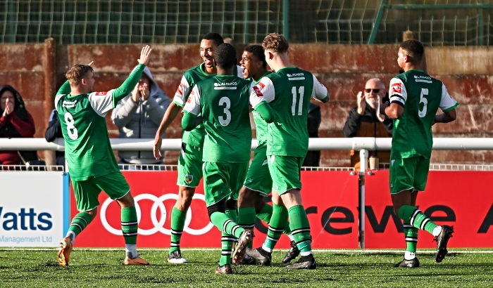Second-half - third Dabbers goal - Byron Harrison celebrates his goal with teammates v Kidsgrove