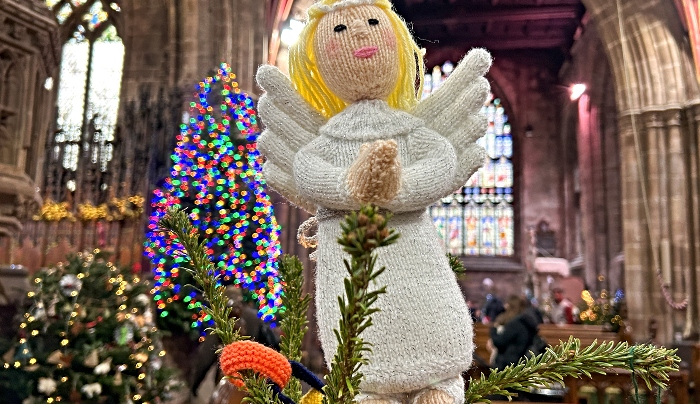 Knitted angel atop a sponsored tree (1)
