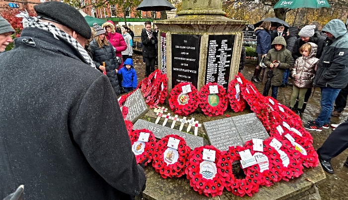 Visitors view wreaths on war memorial after Nantwich Remembrance Service (1)