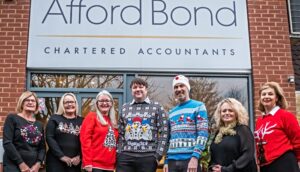 Nantwich accountants ‘Jumper for Joy’ to help support Macmillan charity