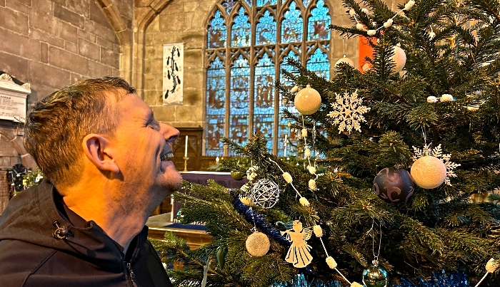 Visitor Andrew Feltham views a decorated Christmas tree (1)